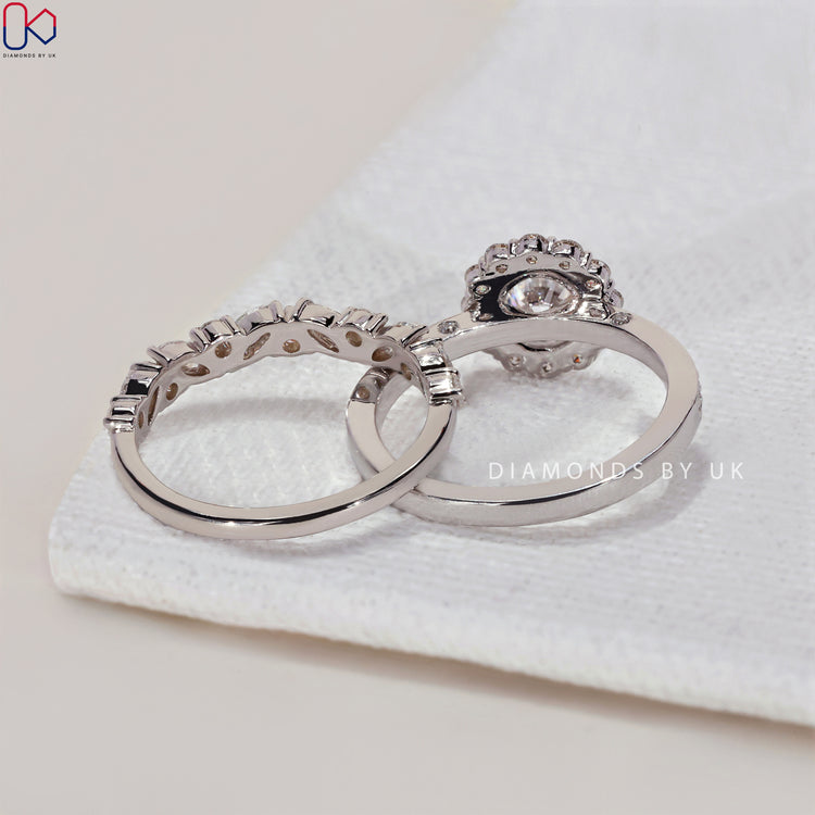 Bridal ring sets UK with an elegant marquise and round cut wedding band for added sparkle.
