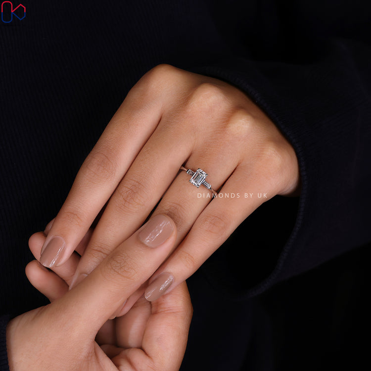 Diamondsbyuk engagement ring with emerald and baguette cut diamond ring.
