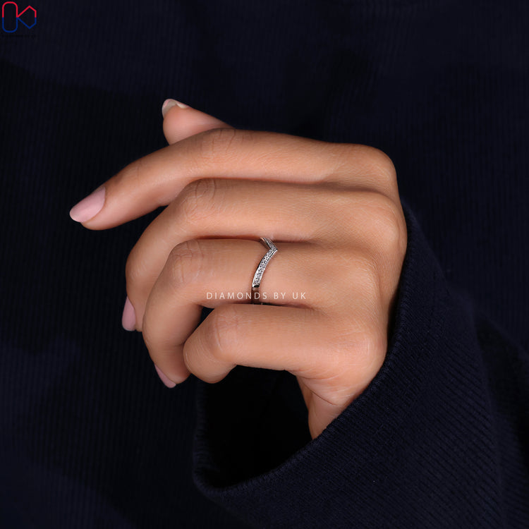 White gold diamond wedding band offering classic beauty with a contemporary twist.
