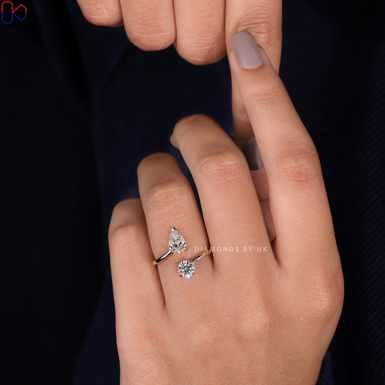 IGI certified pear cut engagement ring set in a claw prong setting.