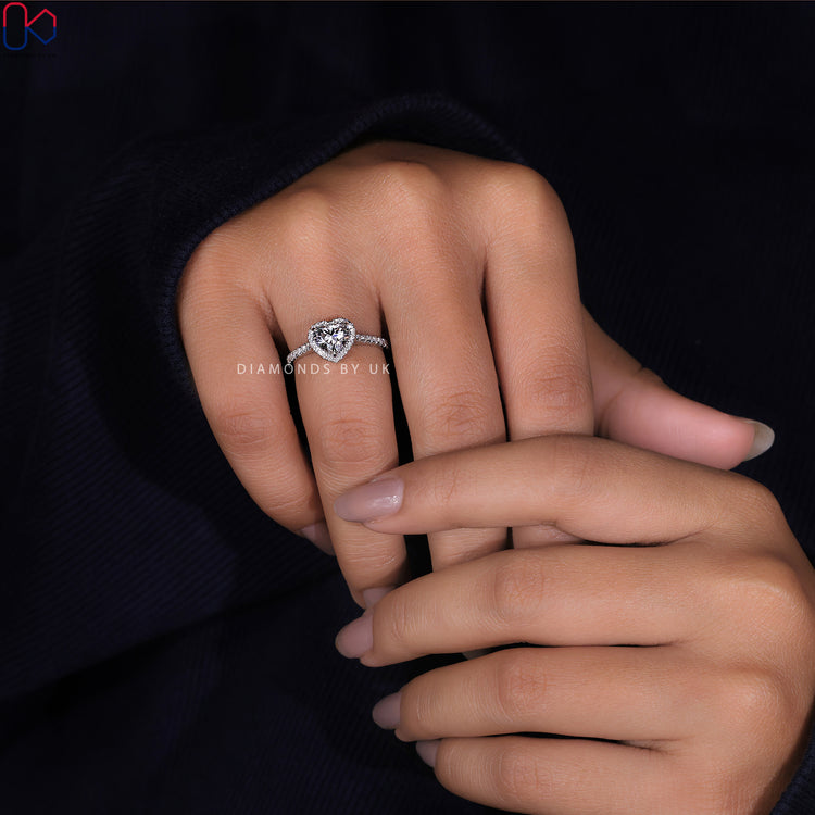 Handmade ring featuring a heart cut diamond set in white gold.