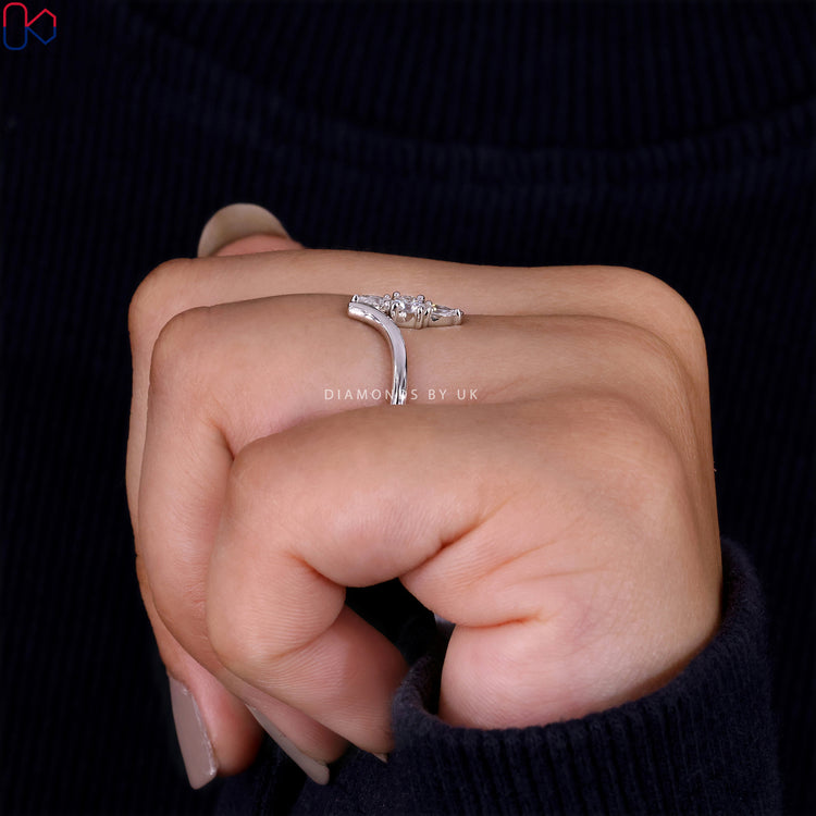 White gold engagement ring with diamond accents
