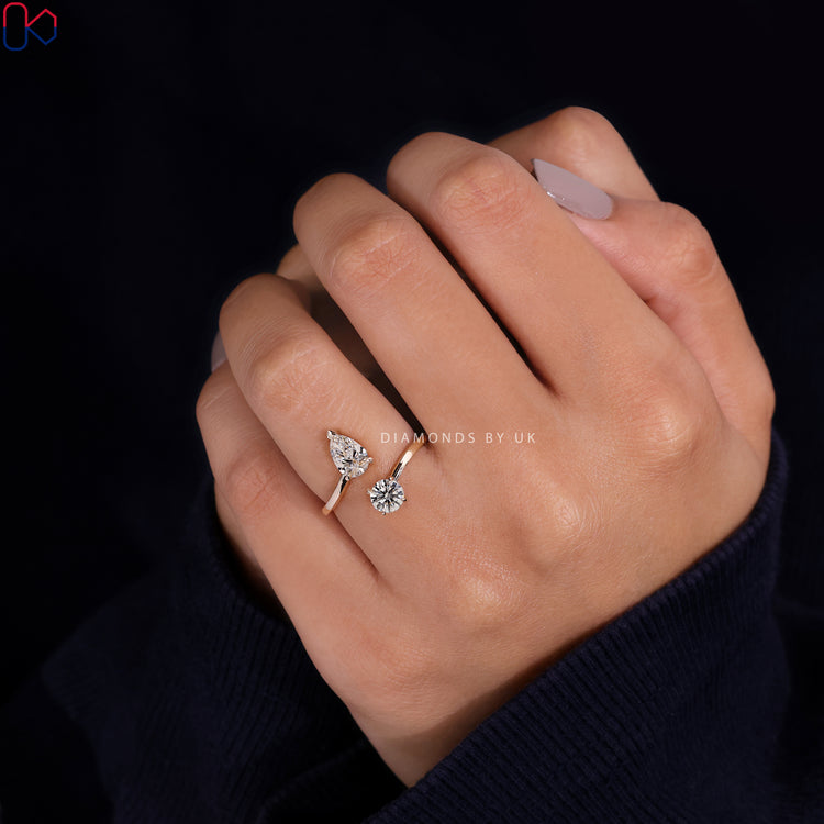 Round diamond ring in a two stone engagement ring design.