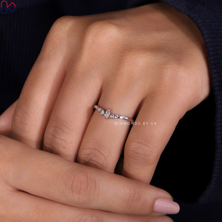 Timeless Diamondsbyuk wedding band featuring marquise-cut diamonds in a sleek design.
