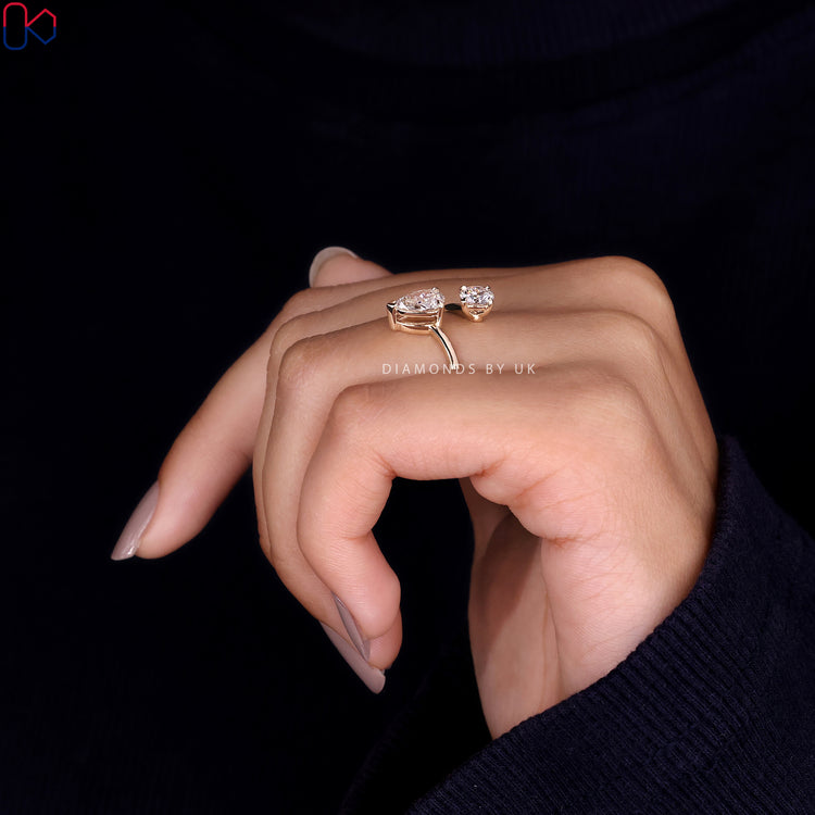 Yellow gold engagement ring with a stunning pear cut diamond.