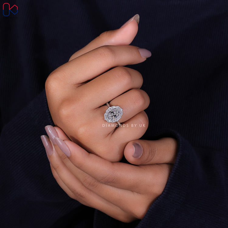 Milgrain ring with an oval halo engagement ring for added elegance.
