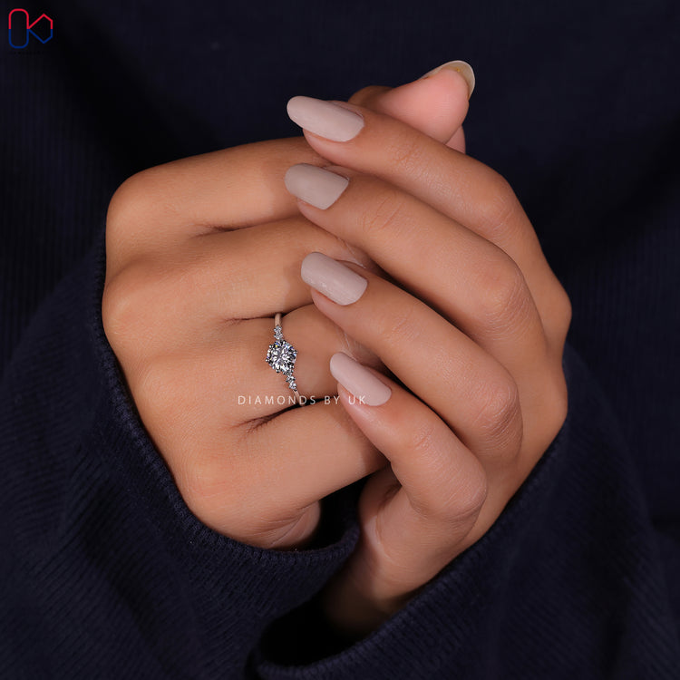 Handmade jewellery featuring a round cut diamond ring in a prong setting ring.
