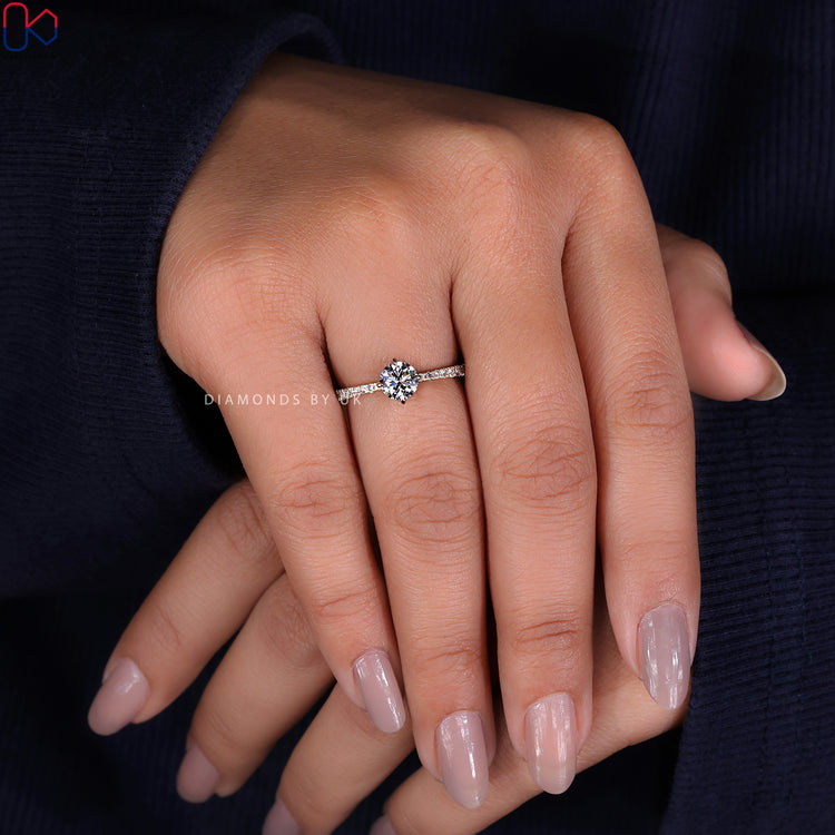 Handmade ring with a captivating hidden halo engagement ring design.
