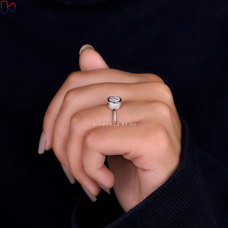 IGI certified Lab Grown Diamond in a sleek bezel setting ring for lasting beauty and value.
