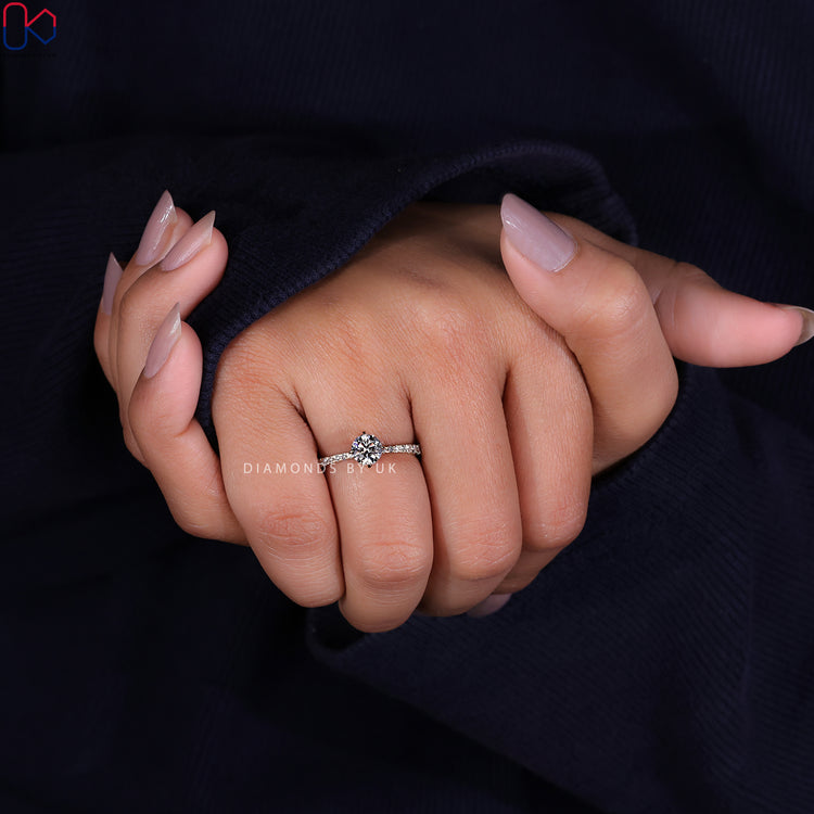 Yellow gold diamond ring with a hidden halo for added sparkle.
