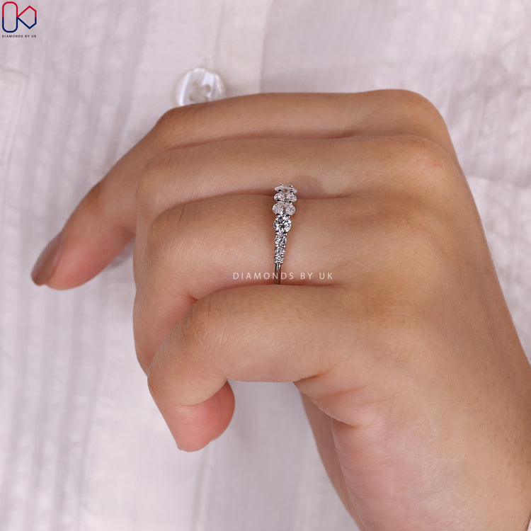 Prong set wedding band designed to secure diamonds beautifully.