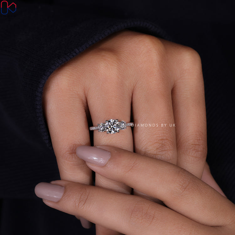 Buy engagement ring featuring a beautiful 3 stone diamond design.