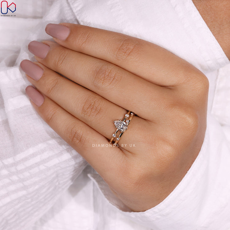 Distance pave wedding band adds brilliance to your bridal set.
