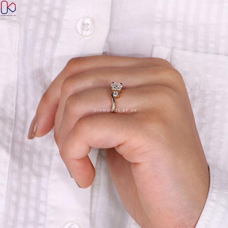 Designer diamond ring with a unique design.
