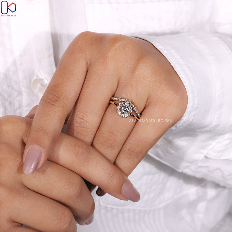 Round diamond engagement ring with prong setting.
