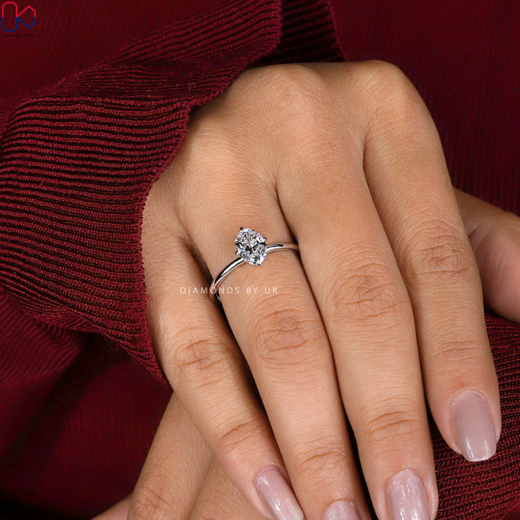 Lab grown diamond ring with compass prong setting.
