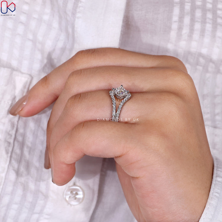 Prong setting ring showcasing a brilliant center diamond.
