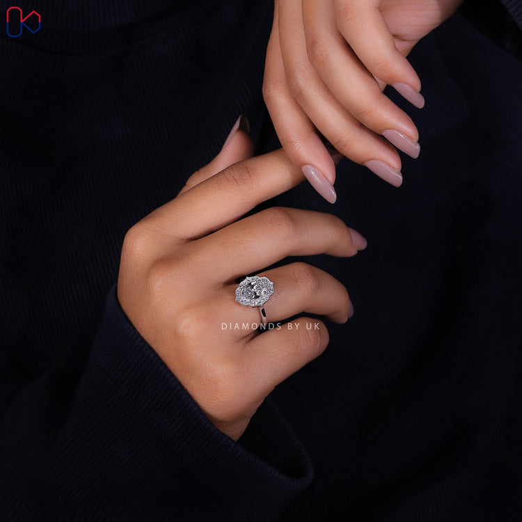 IGI certified oval halo engagement ring ensuring premium quality.
