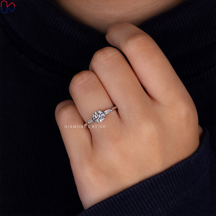 Classic white gold diamond ring with a three stone engagement ring design.