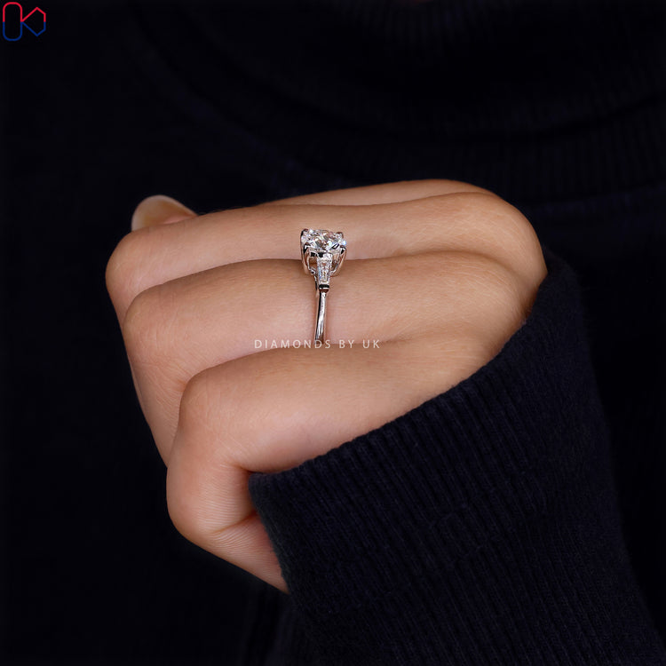 Shop to buy engagement ring with a three stone diamond ring setting.