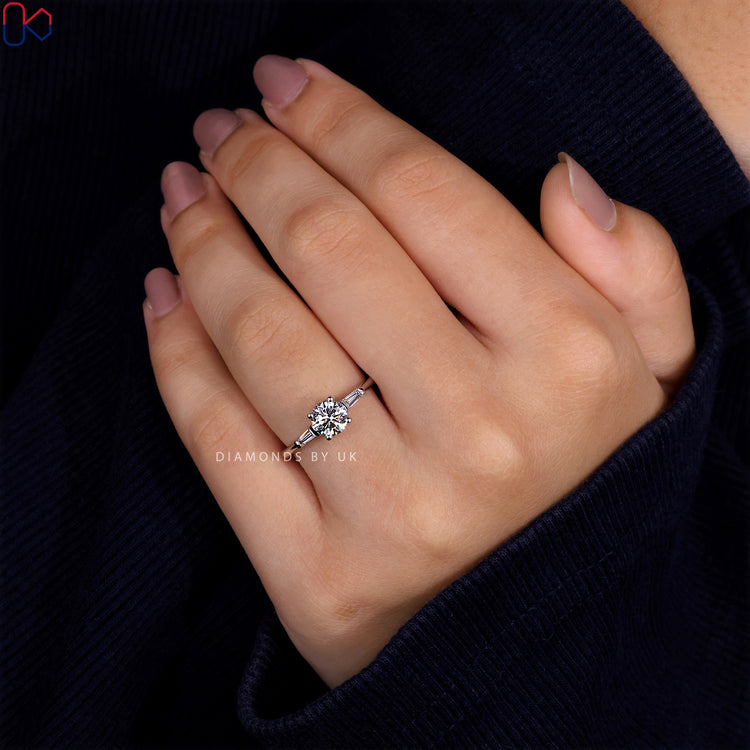 Sustainable Lab Grown Diamond featured in a beautiful three stone engagement ring.