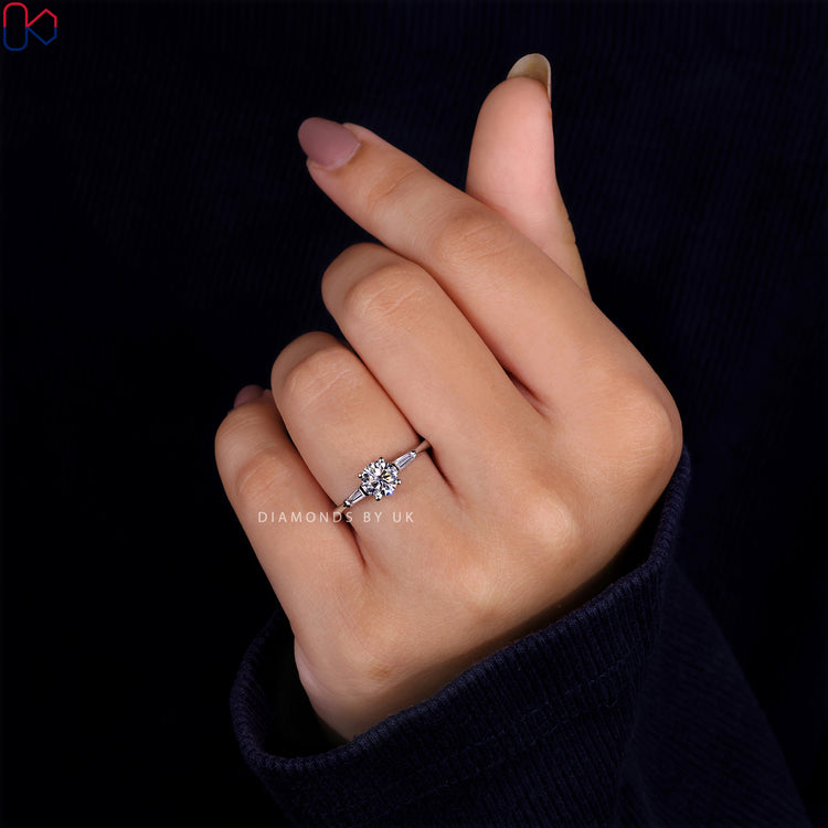 Exquisite Diamondsbyuk engagement ring featuring a three stone engagement ring design.