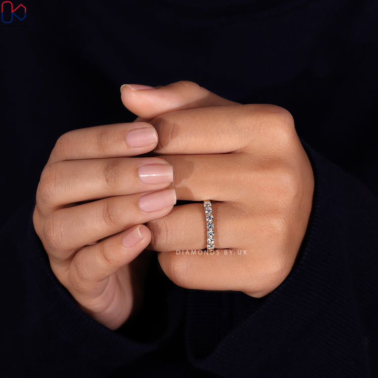 Shared prong wedding band crafted for maximum diamond brilliance and security.
