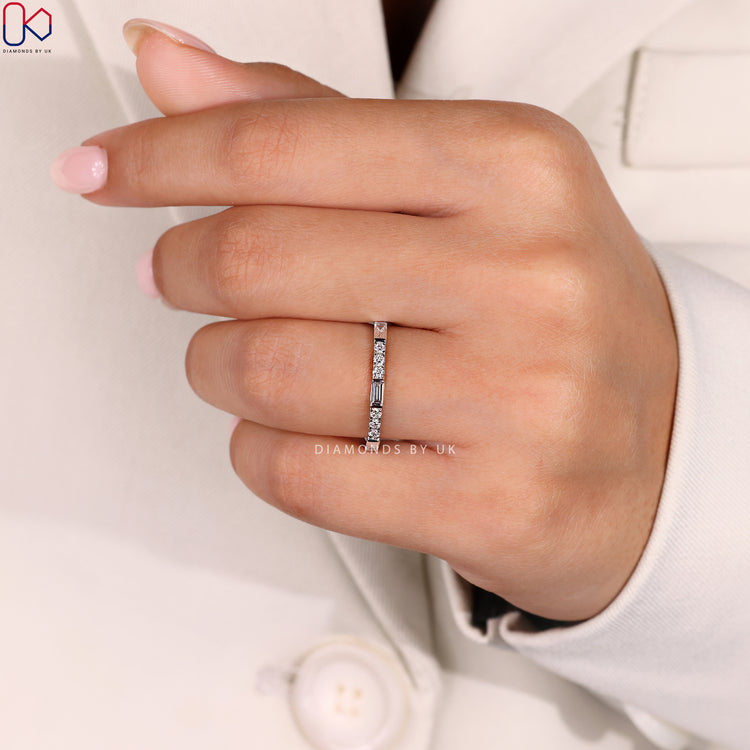 Handmade jewellery ring with prong set diamonds.
