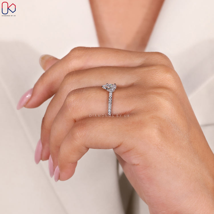 White gold diamond ring with pear cut diamond.
