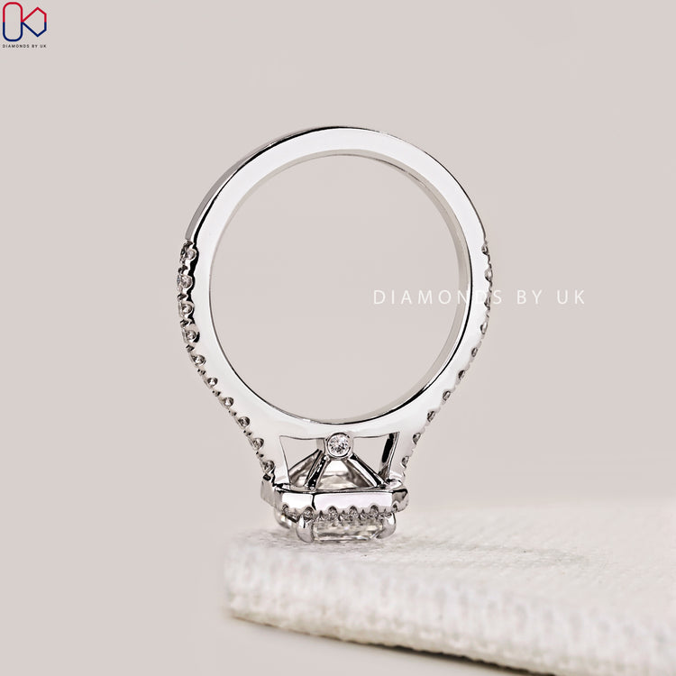 Buy engagement ring with cathedral setting ring.
