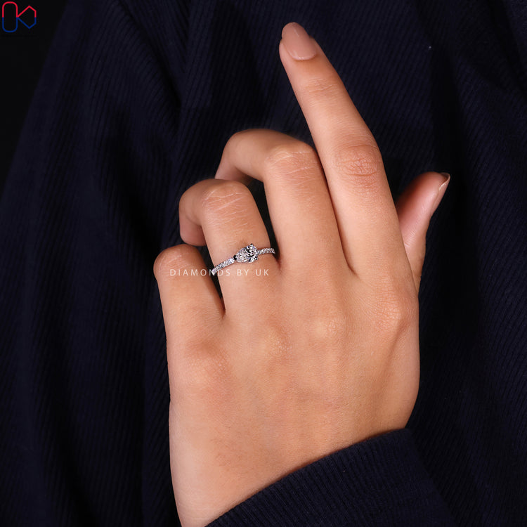 Customize ring with east to west pear shaped diamond.
