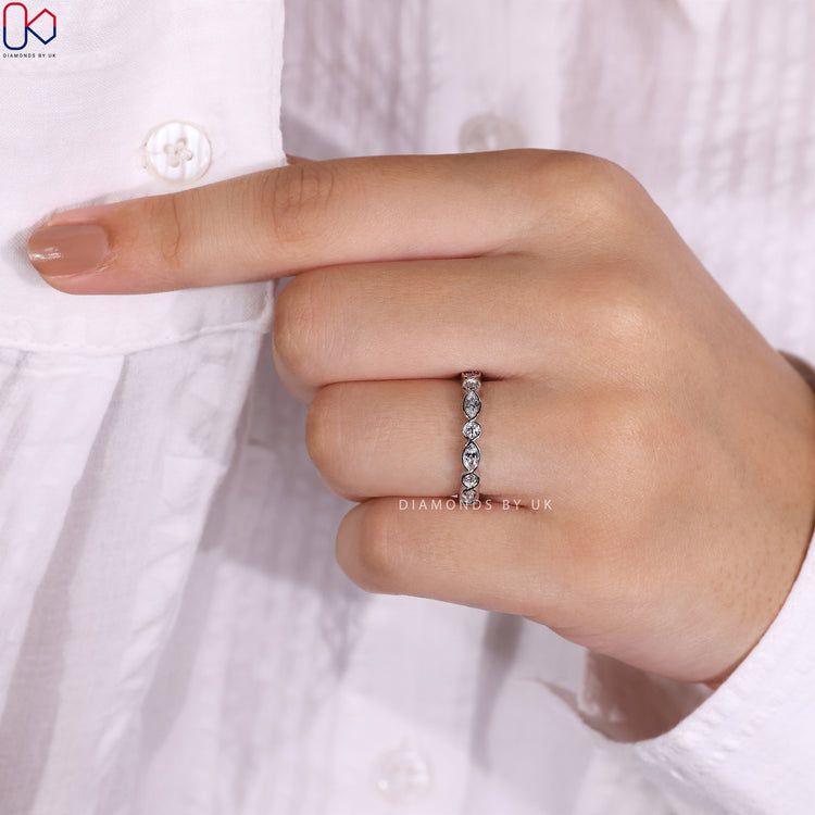 White gold wedding band featuring exquisite marquise diamonds.
