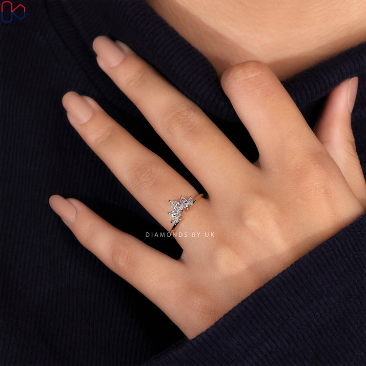 Prong set wedding band ensuring secure diamonds with maximum brilliance.