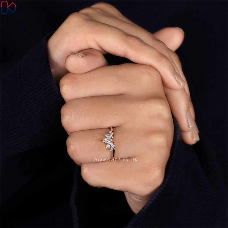Beautiful marquise tiara wedding band offering a regal and sophisticated design.