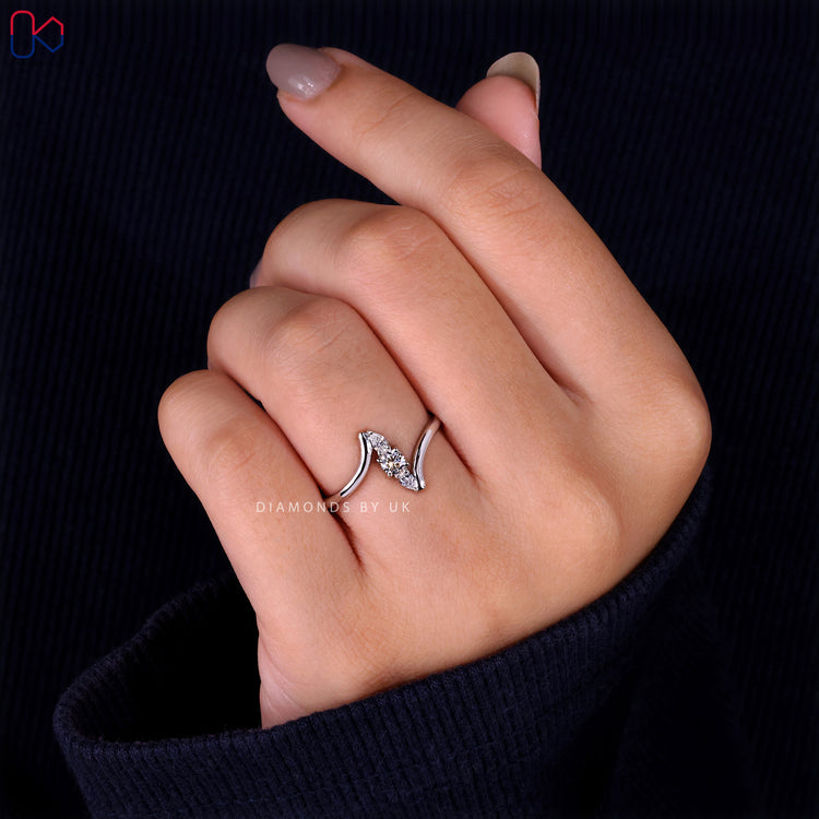 Handmade engagement ring with diamond detail
