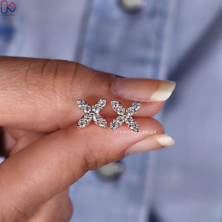 Diamondsbyuk earrings showcasing ethically sourced diamonds.
