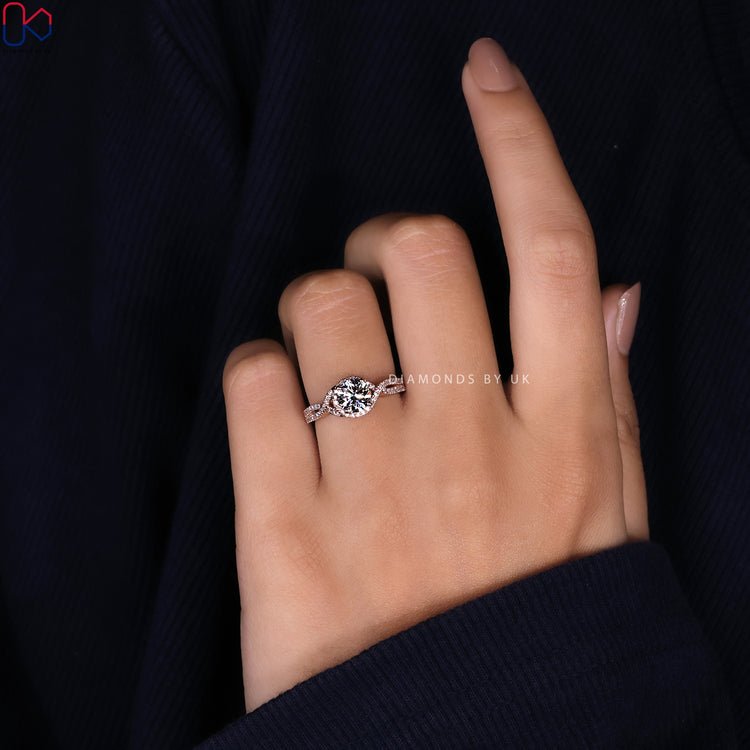 Handmade ring with round diamond and halo setting.
