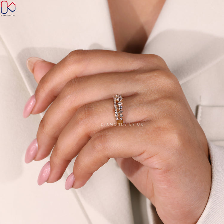 A stunning half eternity diamond wedding band featuring IGI certified diamonds.
