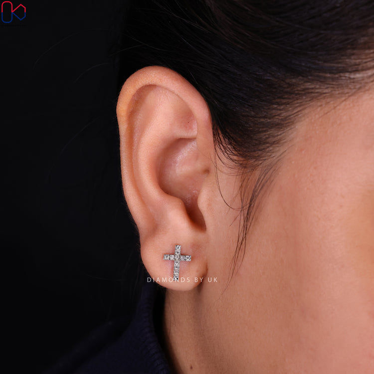 Round diamond earrings that add a touch of luxury to your style.
