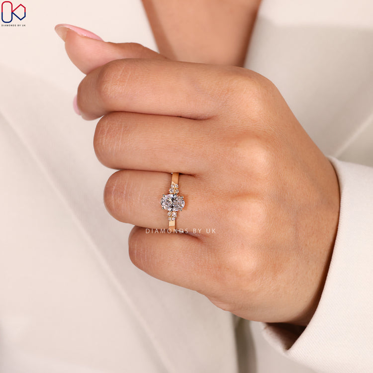 Elegant oval diamond ring set in handmade yellow gold.
