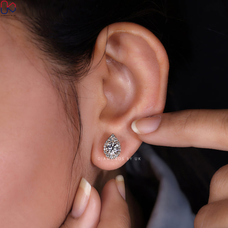 Yellow gold diamond earrings with a timeless design.
