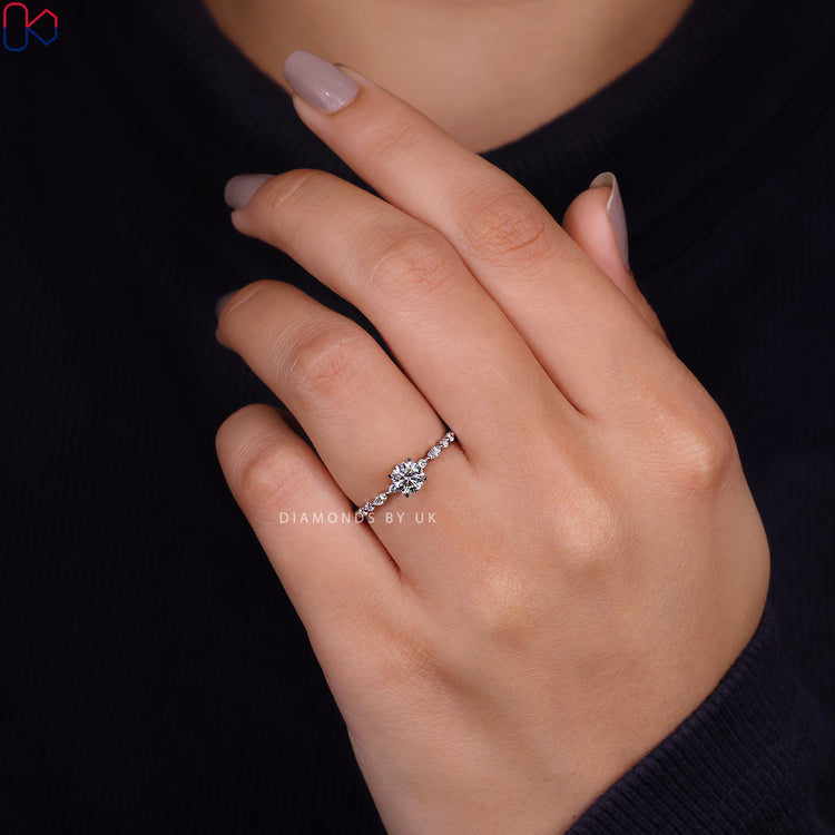 IGI certified Lab Grown Diamond in a round cut diamond ring with a unique floating bubble band ring.

