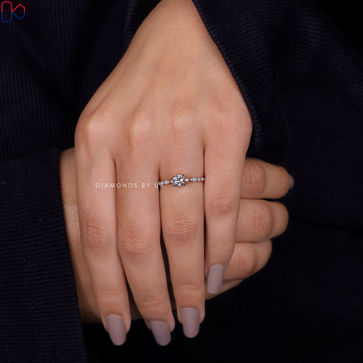 Handmade jewellery featuring a round cut diamond ring in white gold engagement ring.
