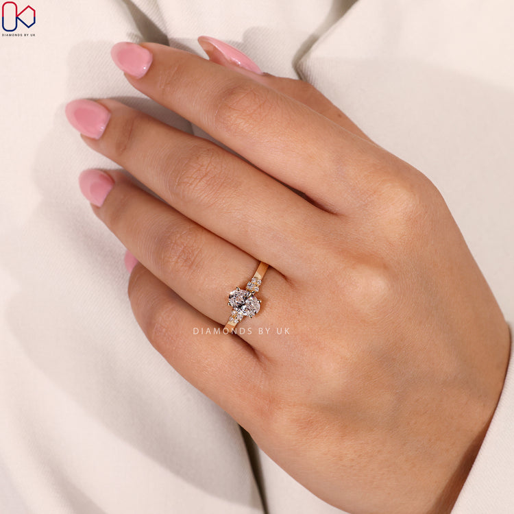 Handmade engagement ring with a round diamond centerpiece.
