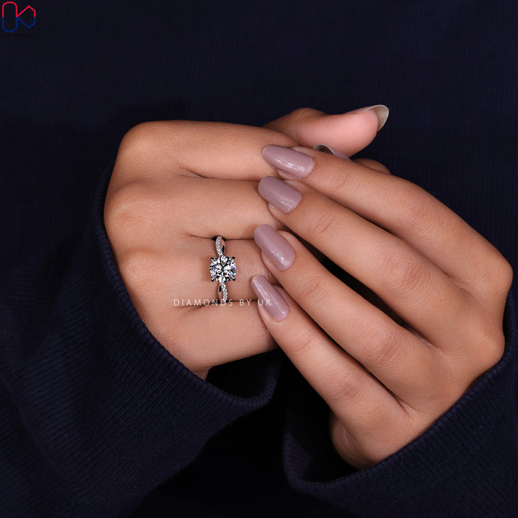 Shop to buy engagement ring featuring a beautiful round diamond ring.
