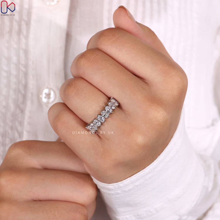 Half eternity wedding band showcasing a stunning array of diamonds.