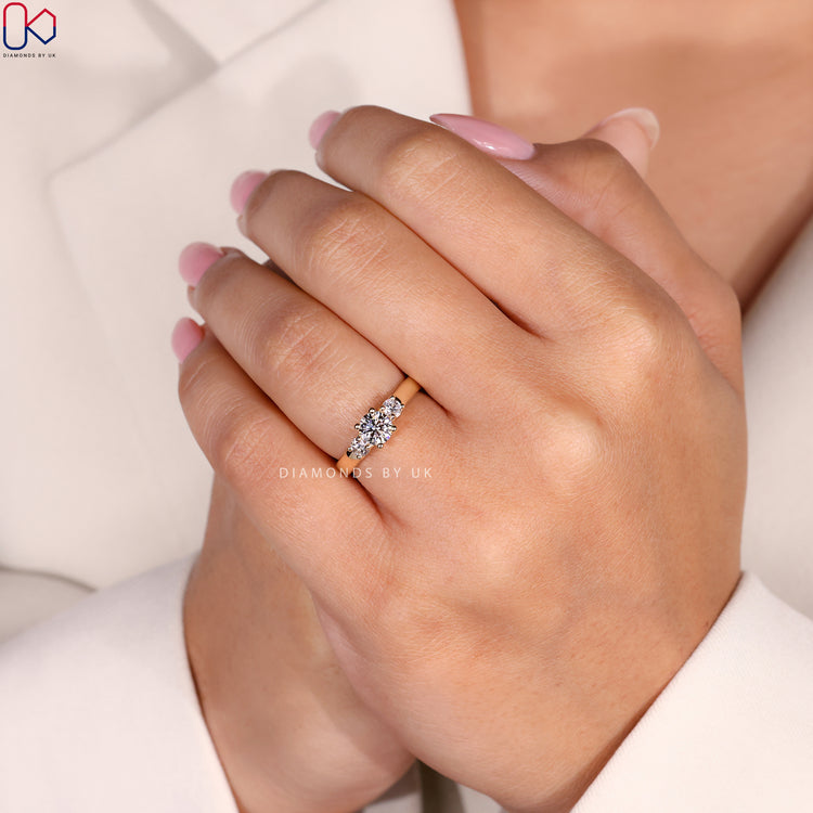 Three Stone Round Diamond Ring with Lab Grown Diamonds in IGI certified prong setting.
