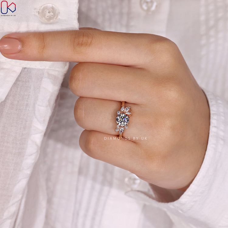 Rose gold engagement ring with double claw prong ring.
