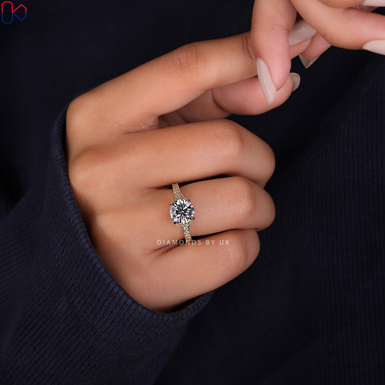 Yellow gold ring featuring a gorgeous round brilliant cut diamond ring design.