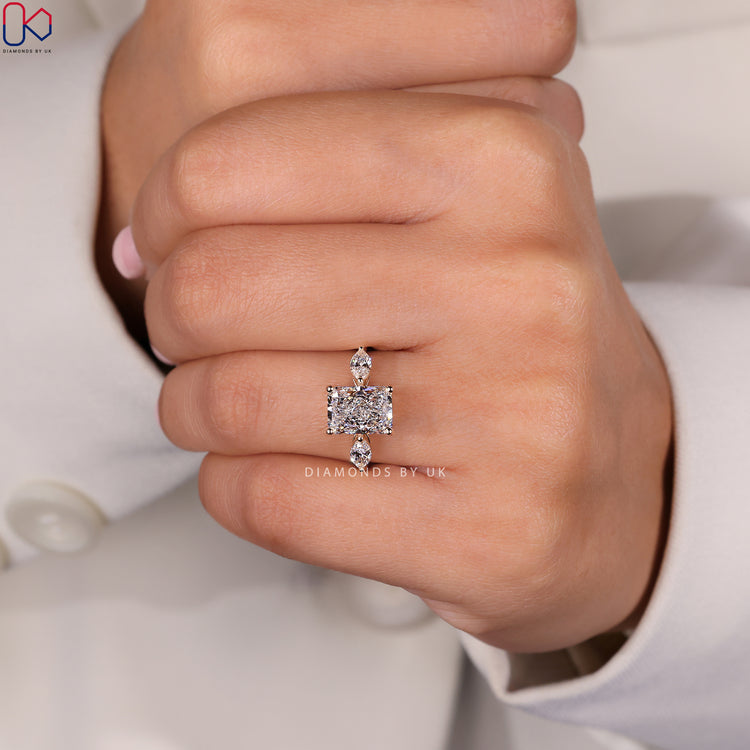 Elegant marquise side stones for a unique touch.
